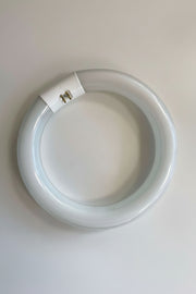 Circular light bulb on a white background