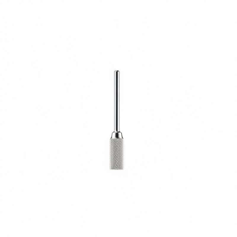 A single metallic nail drill bit with a knurled textured lower section and a slim straight upper shaft, centered on a plain white background.