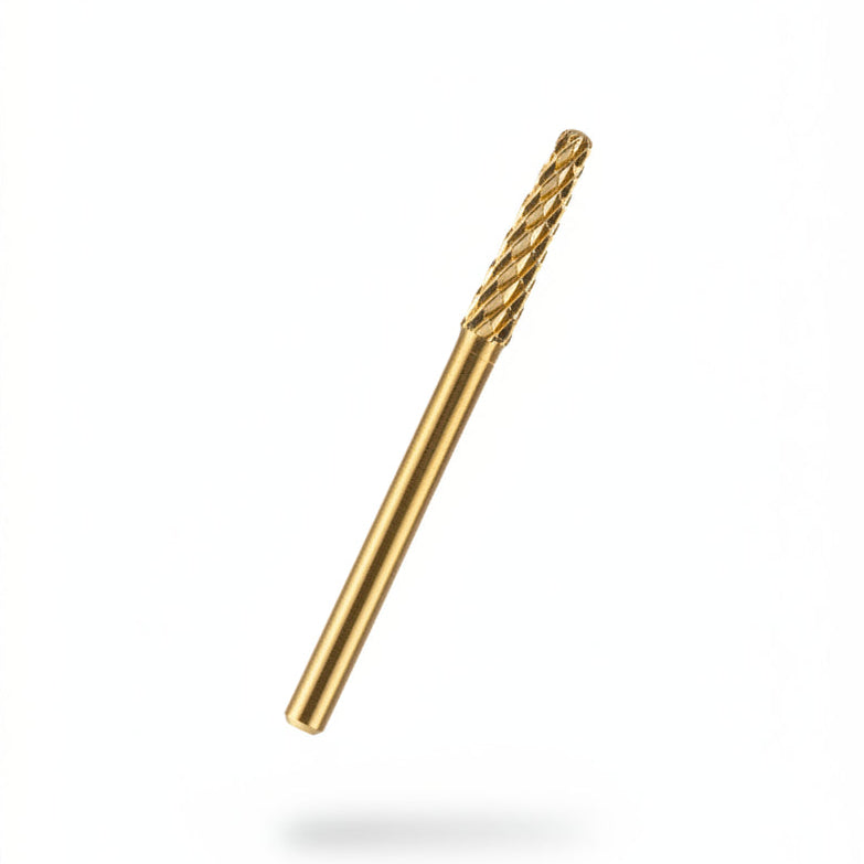 A single gold-colored metal nail drill bit with a fluted cutting tip, shown floating diagonally against a plain white background with a soft drop shadow.