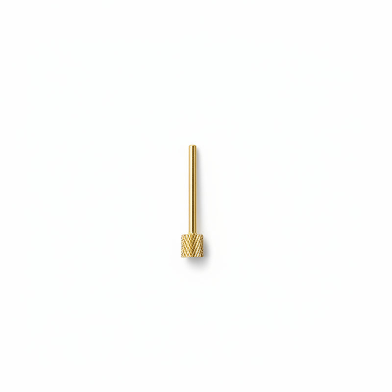 A single gold-colored nail drill bit featuring a textured knurled base and a slim straight shaft, centered on a plain white background.