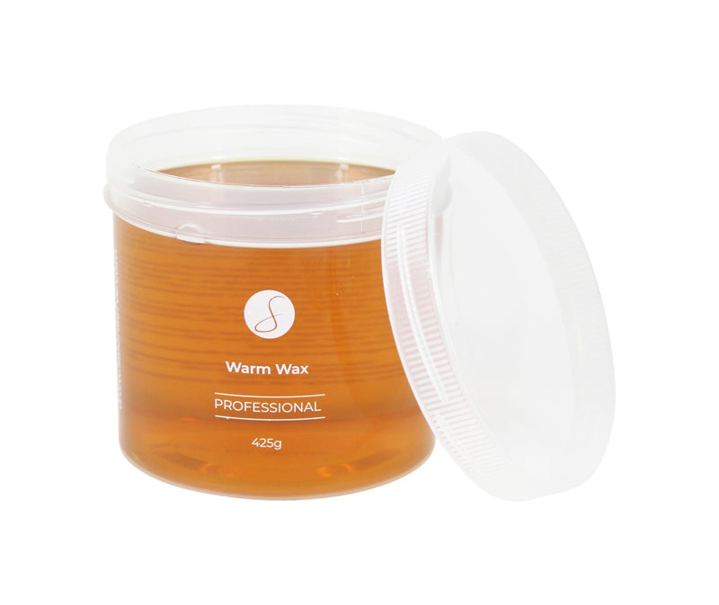 Clear pot with warm soft honey wax by salonserve