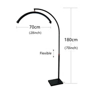 Black floor lamp with measurements on a white background