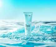 sienna x tan remover and exfoliator scrub in a blue bottle