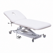 White massage table with adjustable headrest on a white background with facehole and electric height adjustment